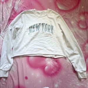 white graphic slightly cropped longsleeve